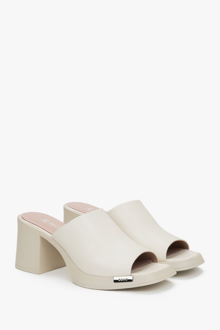 Elegant light beuge women's leather mules by Estro, offering stability with a comfortable block heel.