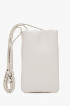 Beige natural leather phone bag.
