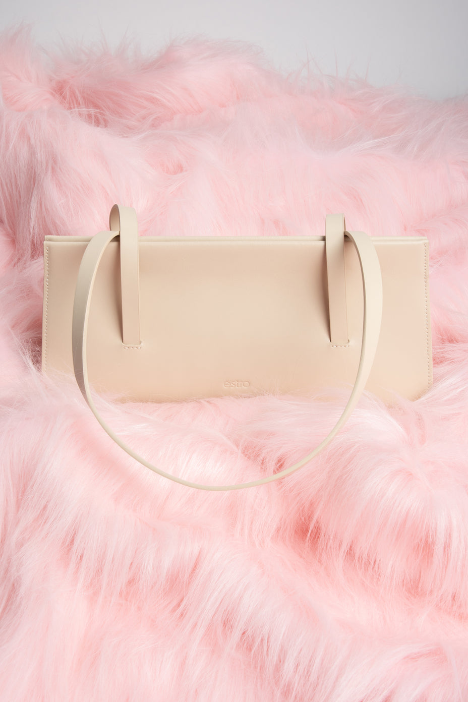 Stylish light beige women's handbag by Estro, made of natural leather.