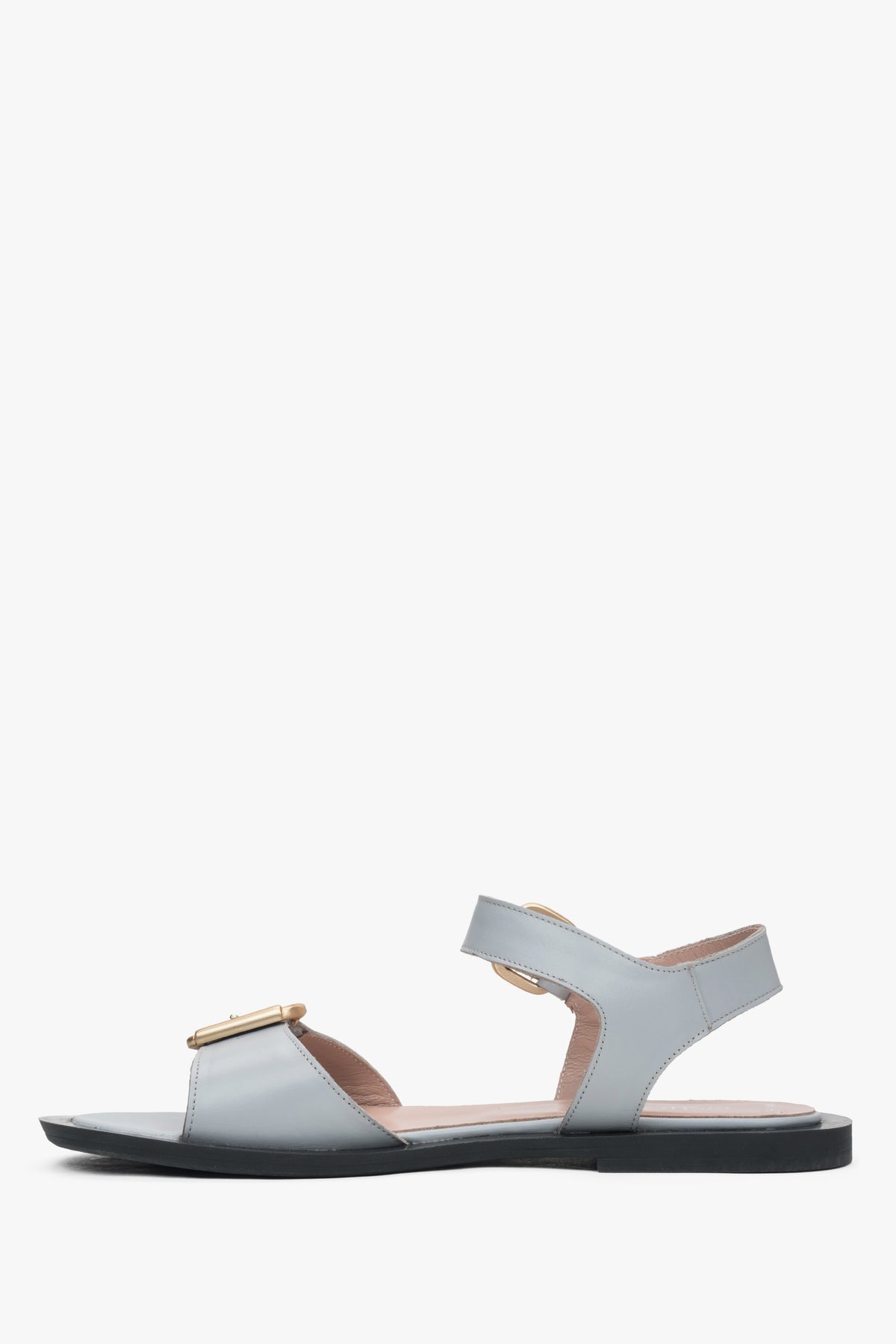 Comfortable light blue women's sandals by Estro, made of leather and set on a flat heel – perfect for everyday wear.
