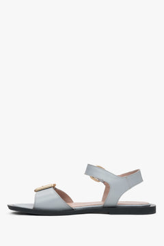 Comfortable light blue women's sandals by Estro, made of leather and set on a flat heel – perfect for everyday wear.