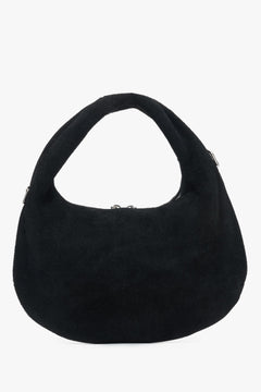 Black handbag by Estro, made of natural velour.