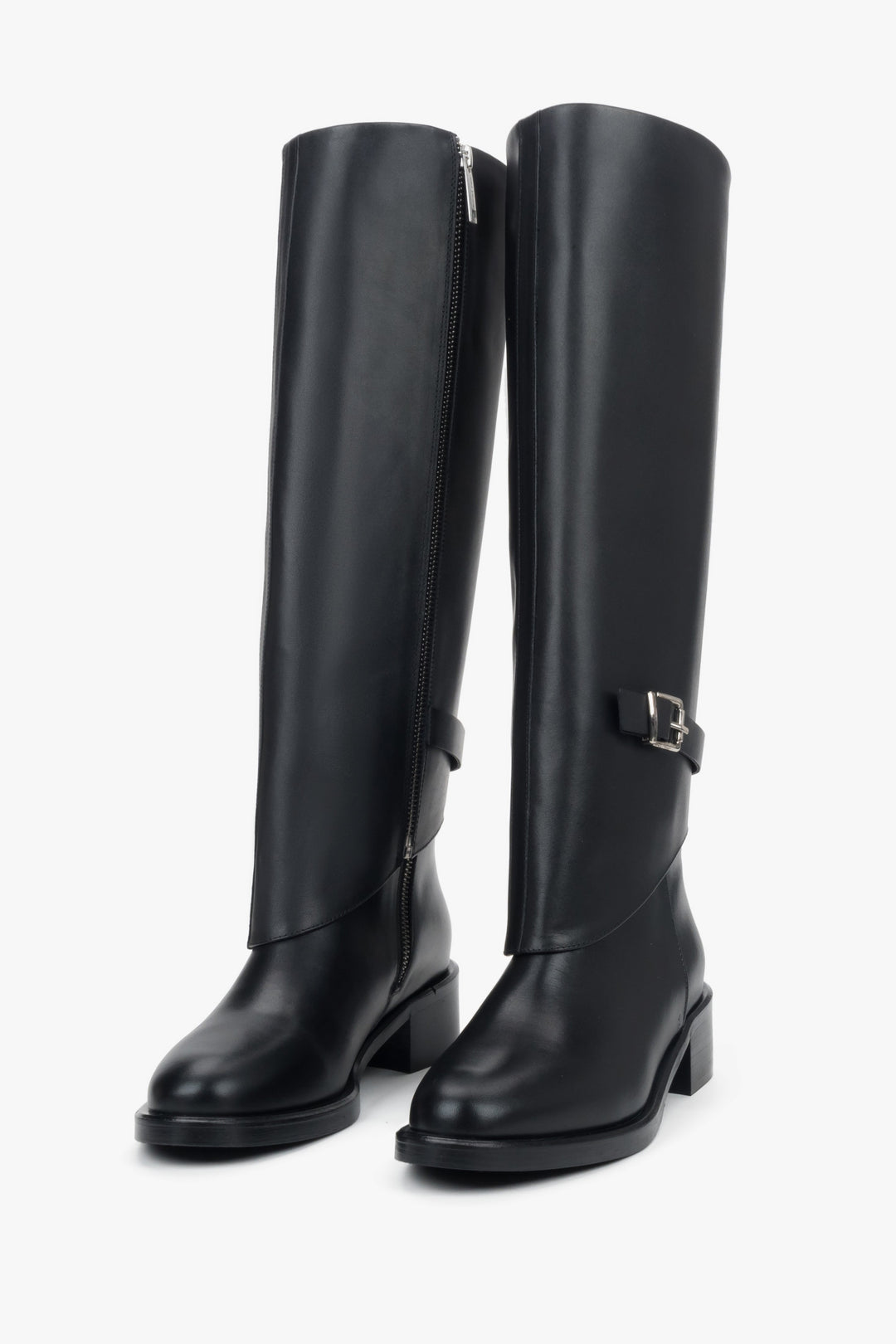 Black 2-in-1 ankle and knee-high boots in genuine leather with decorative buckle.