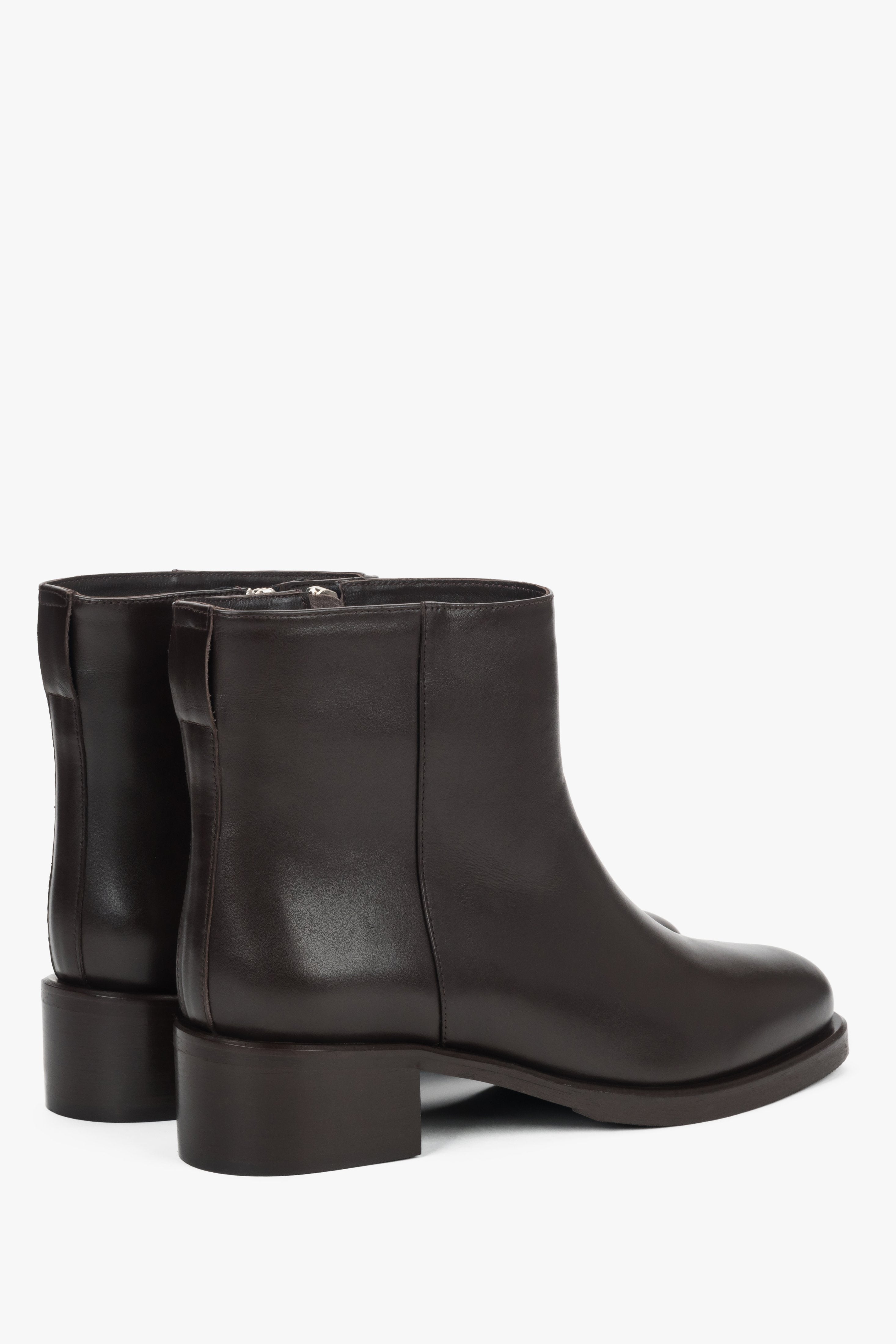 Dark brown leather 2-in-1 ankle and knee-high boots with decorative buckle.
