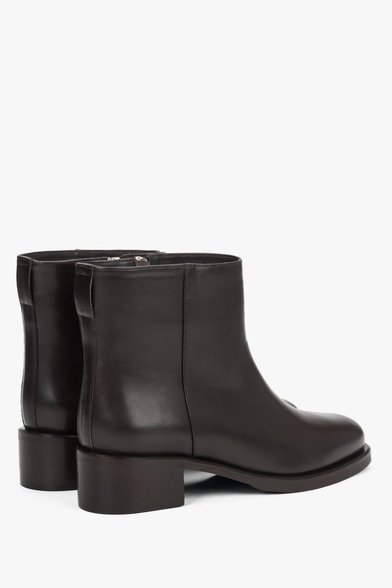 Dark brown leather 2-in-1 ankle and knee-high boots with decorative buckle.
