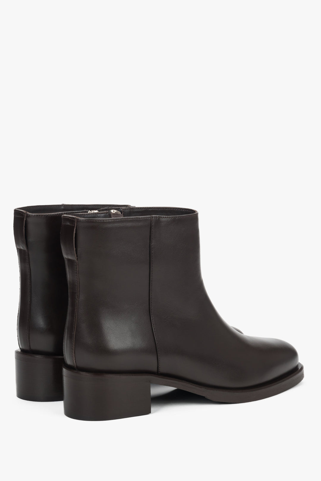 Dark brown leather 2-in-1 ankle and knee-high boots with decorative buckle.
