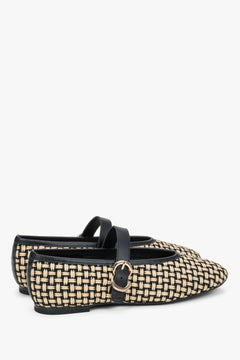 Beige woven women's Mary Jane ballet flats with black leather finishes and a gold buckle by Frau.