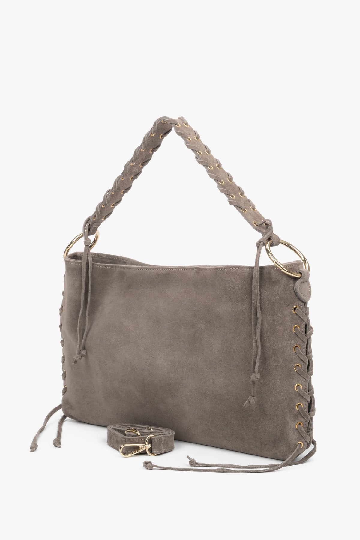 The braided handle and adjustable shoulder strap (up to 125 cm) provide versatile carrying options.