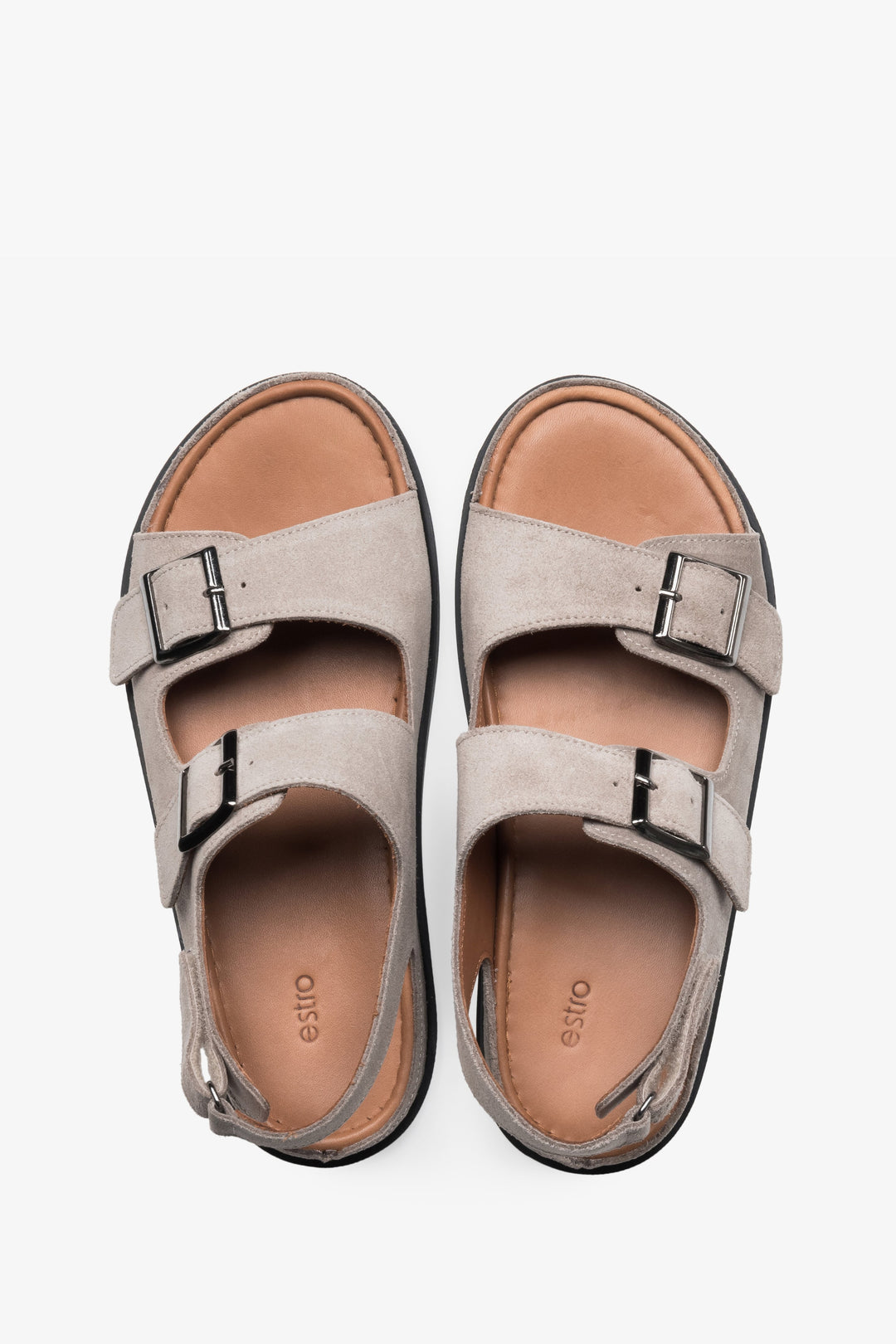 Beige women’s Estro comfort sandals made of natural suede with adjustable straps.