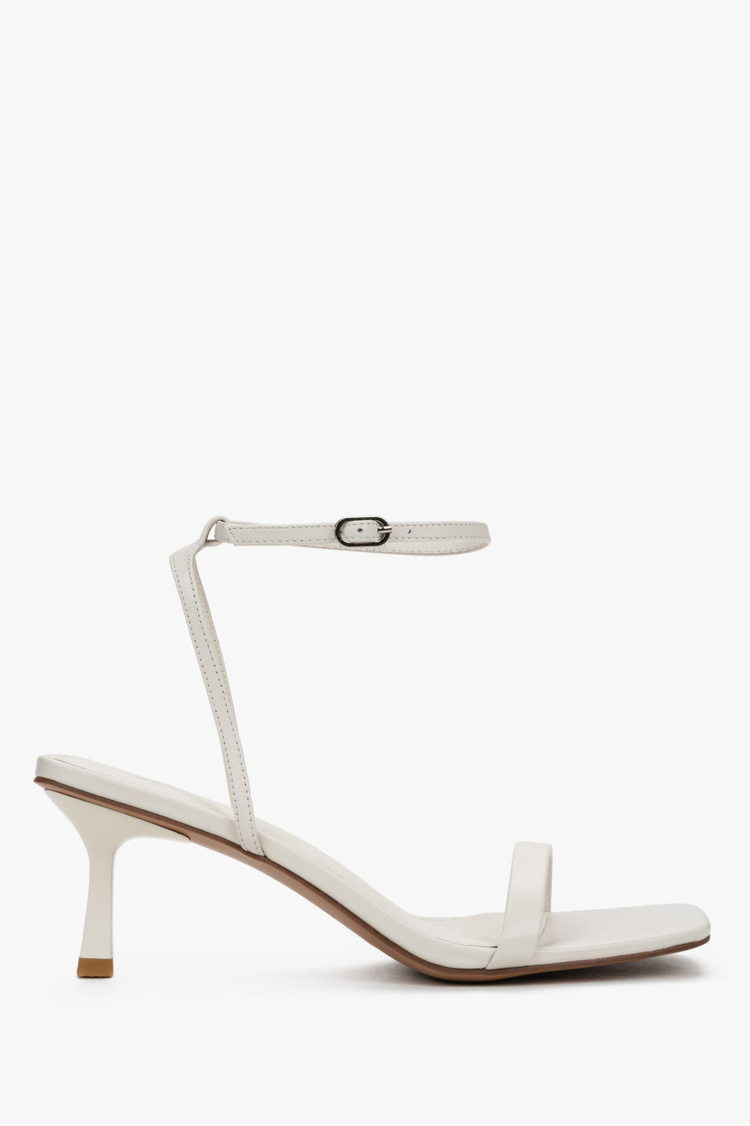 Women's beige leather funnel heel sandals by Estro with silver details.