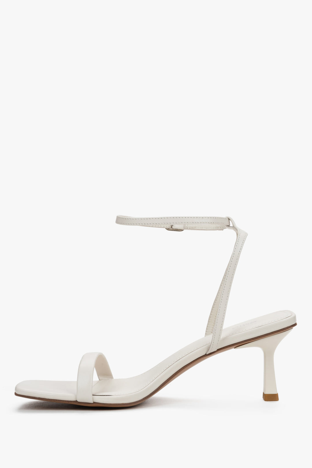 Women's beige leather sandals with square toe and buckle fastening.