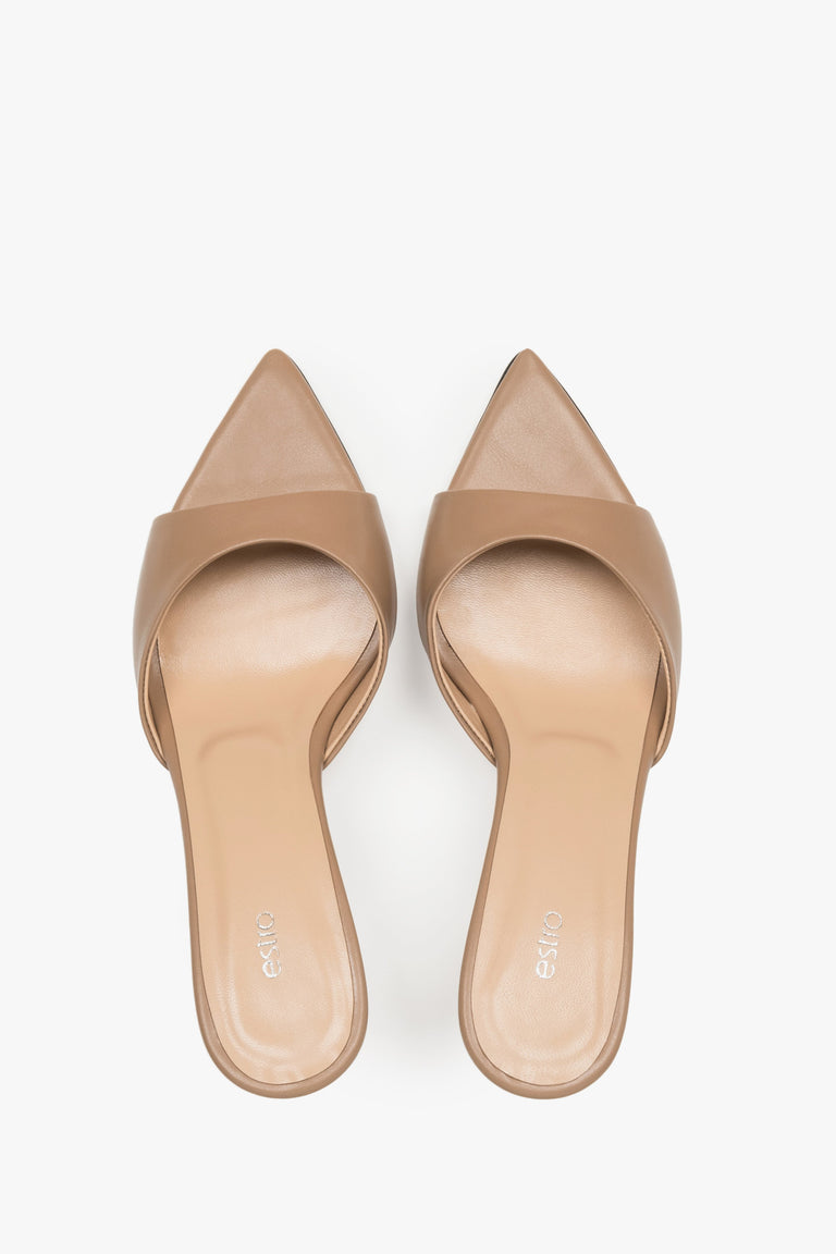 Top view of a pair of women's beige leather heeled mules by Estro
