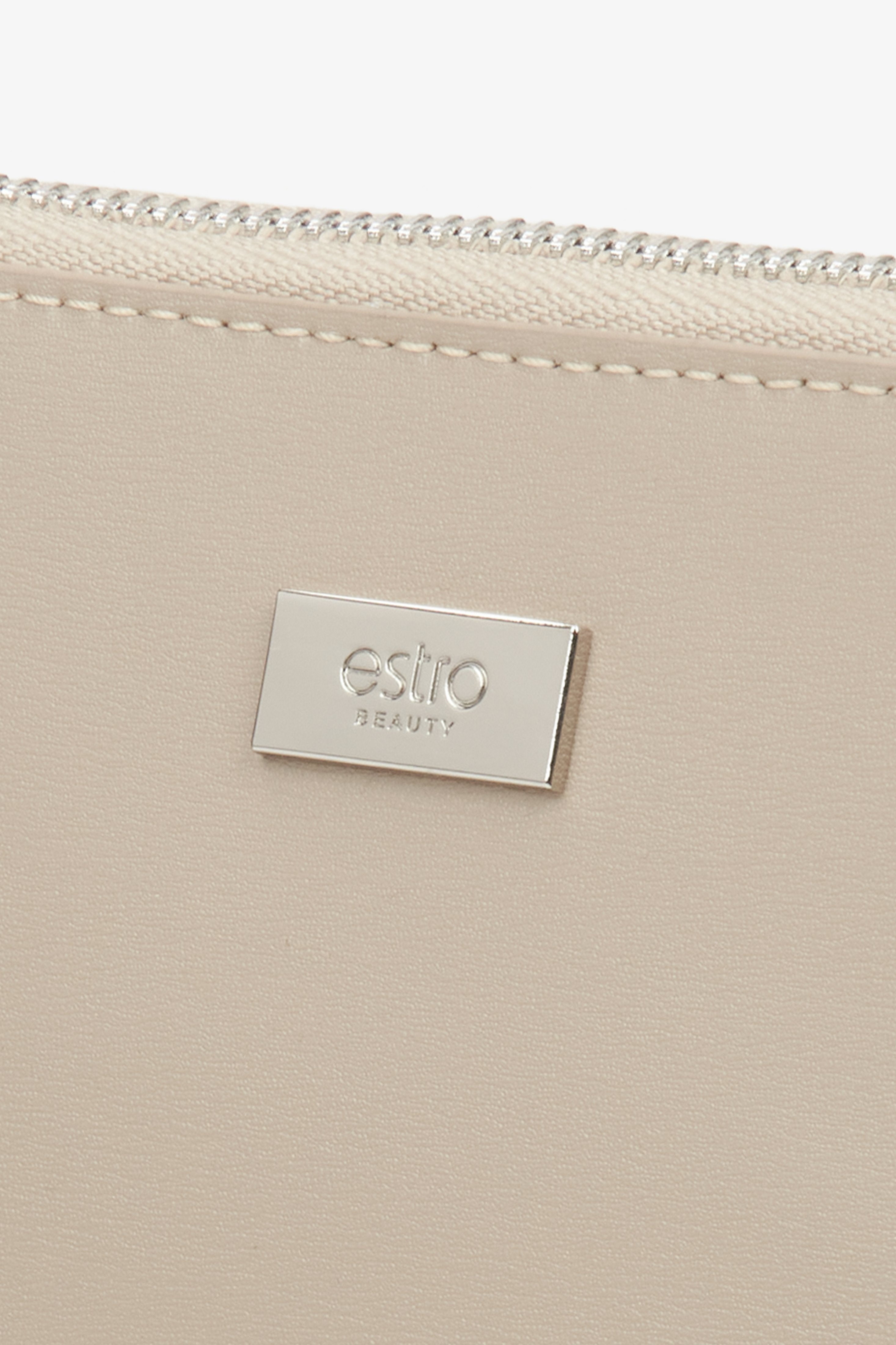 Estro's elegant beige leather makeup bag for women - details.