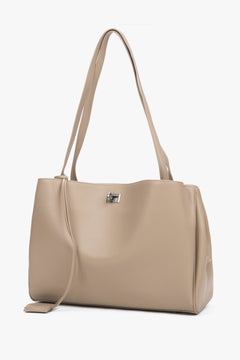 Front view of women's beige leather shoulder bag by Estro