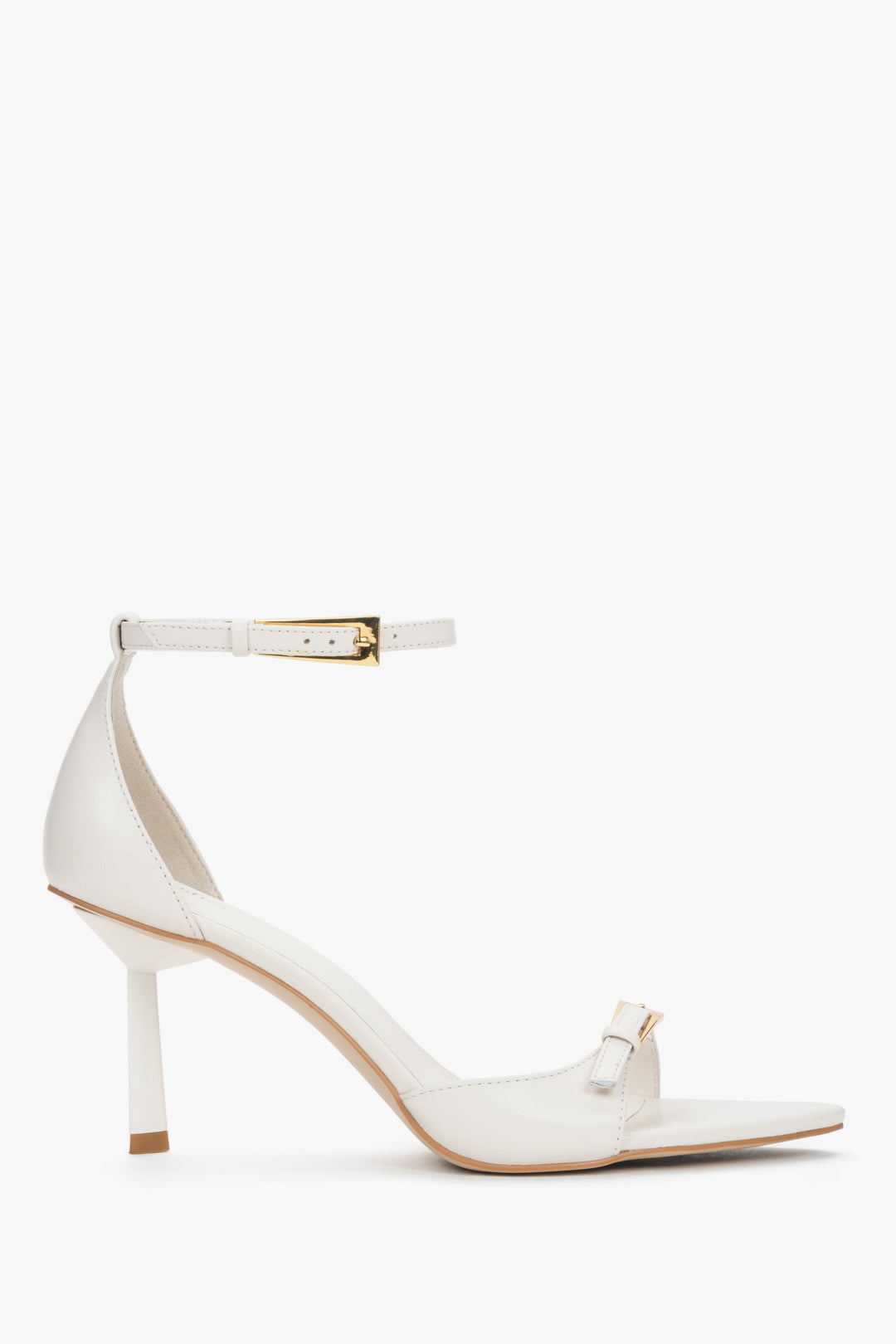 Side view of women's beige leather sandals with slim stiletto heel.