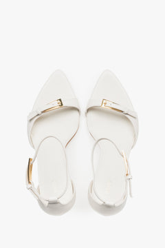 Top view of women's beige leather stiletto sandals by Estro.