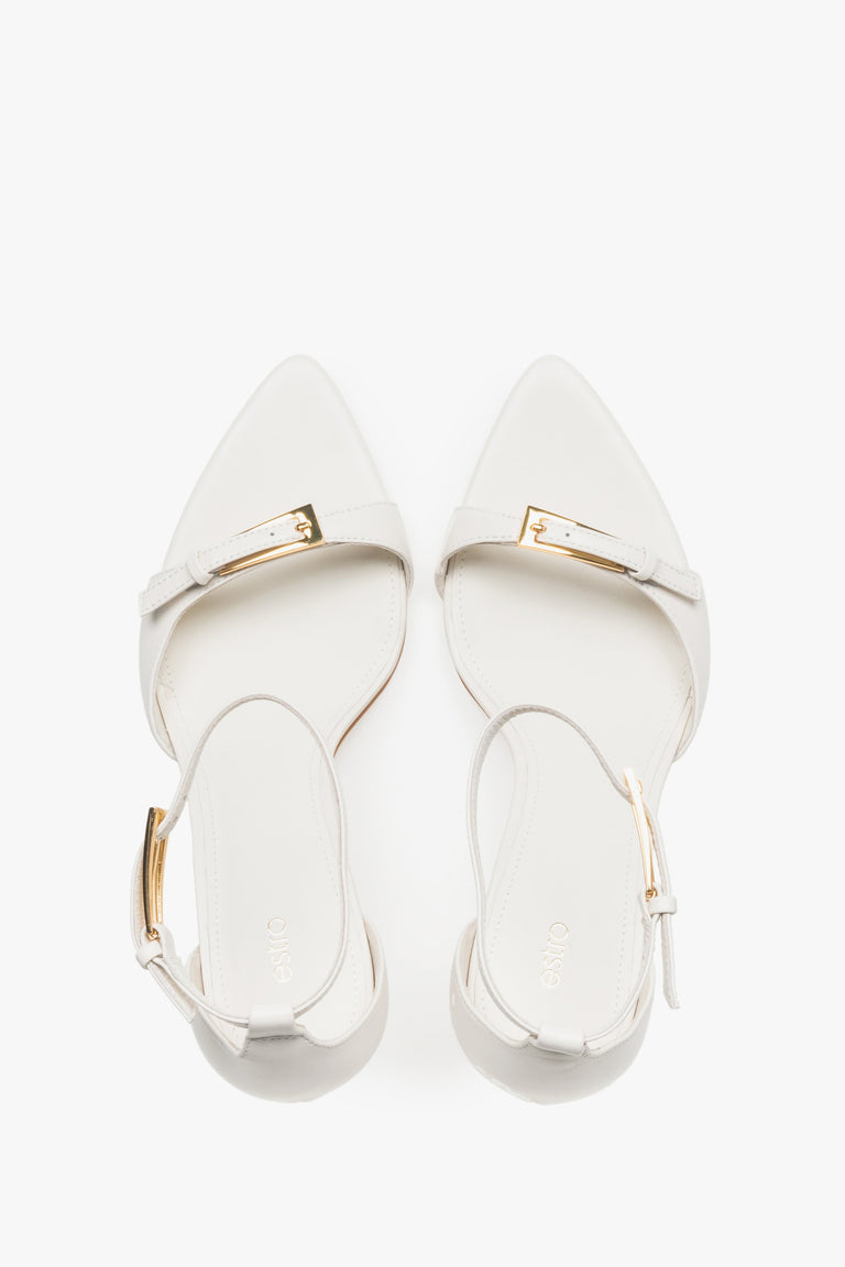 Top view of women's beige leather stiletto sandals by Estro.