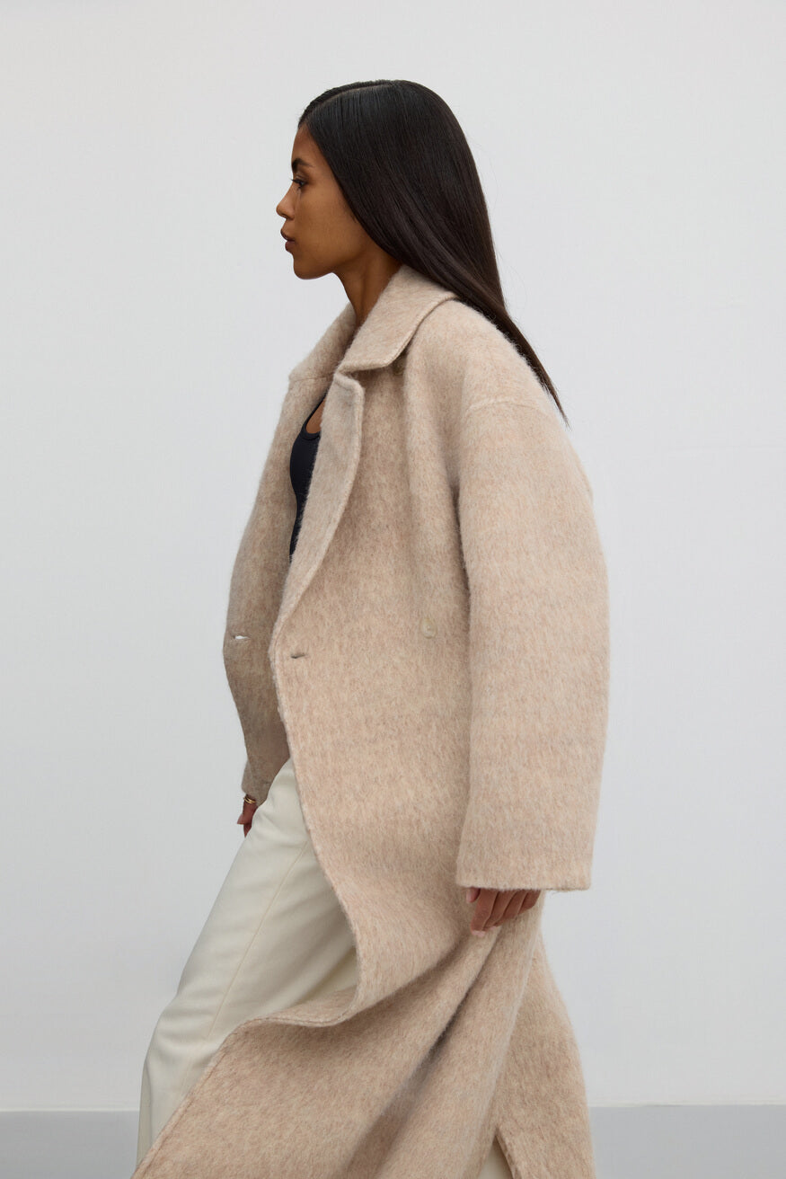 Women's beige belted trench coat with wool blend.