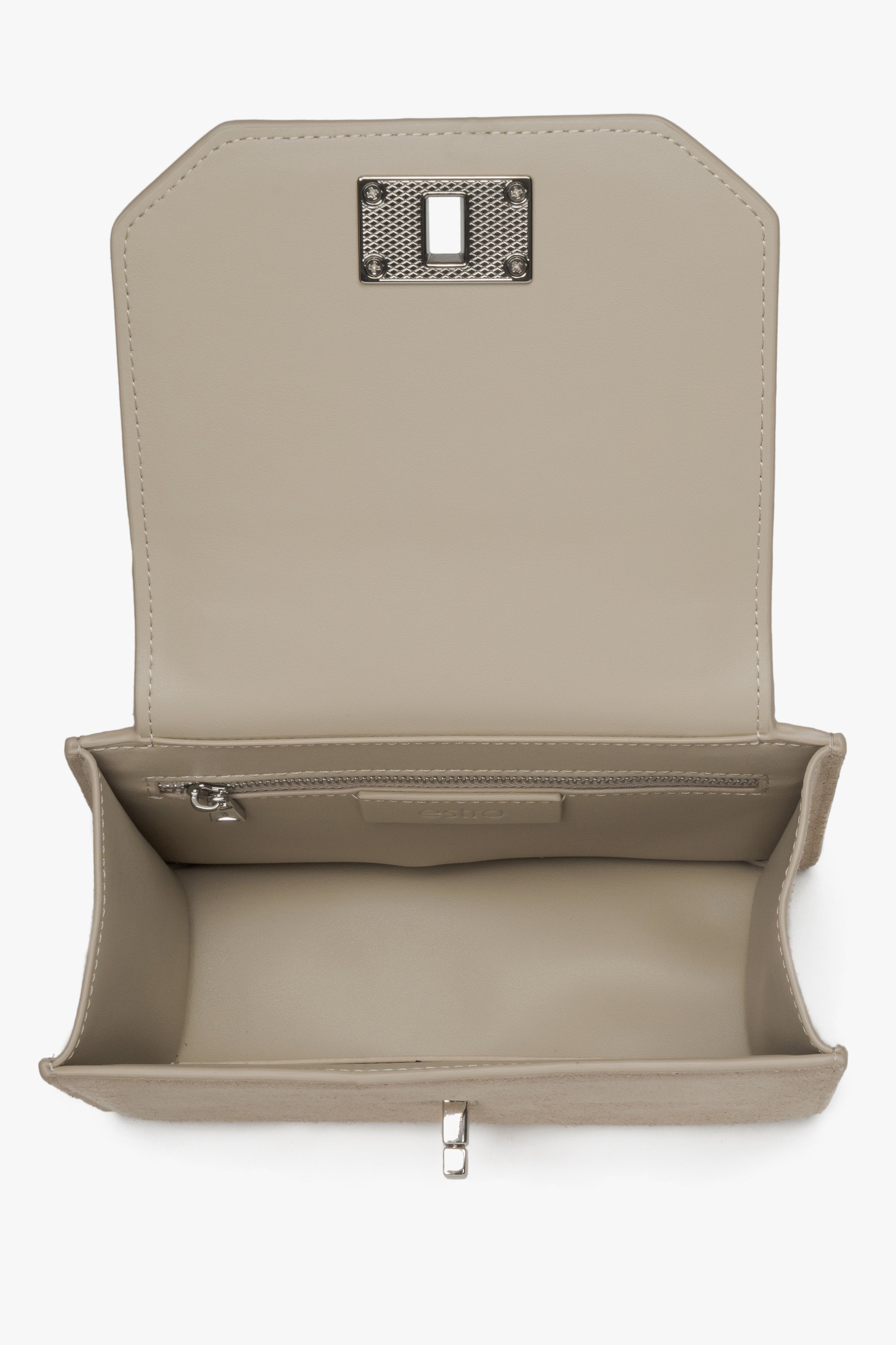 Inside view of beige mini satchel bag.