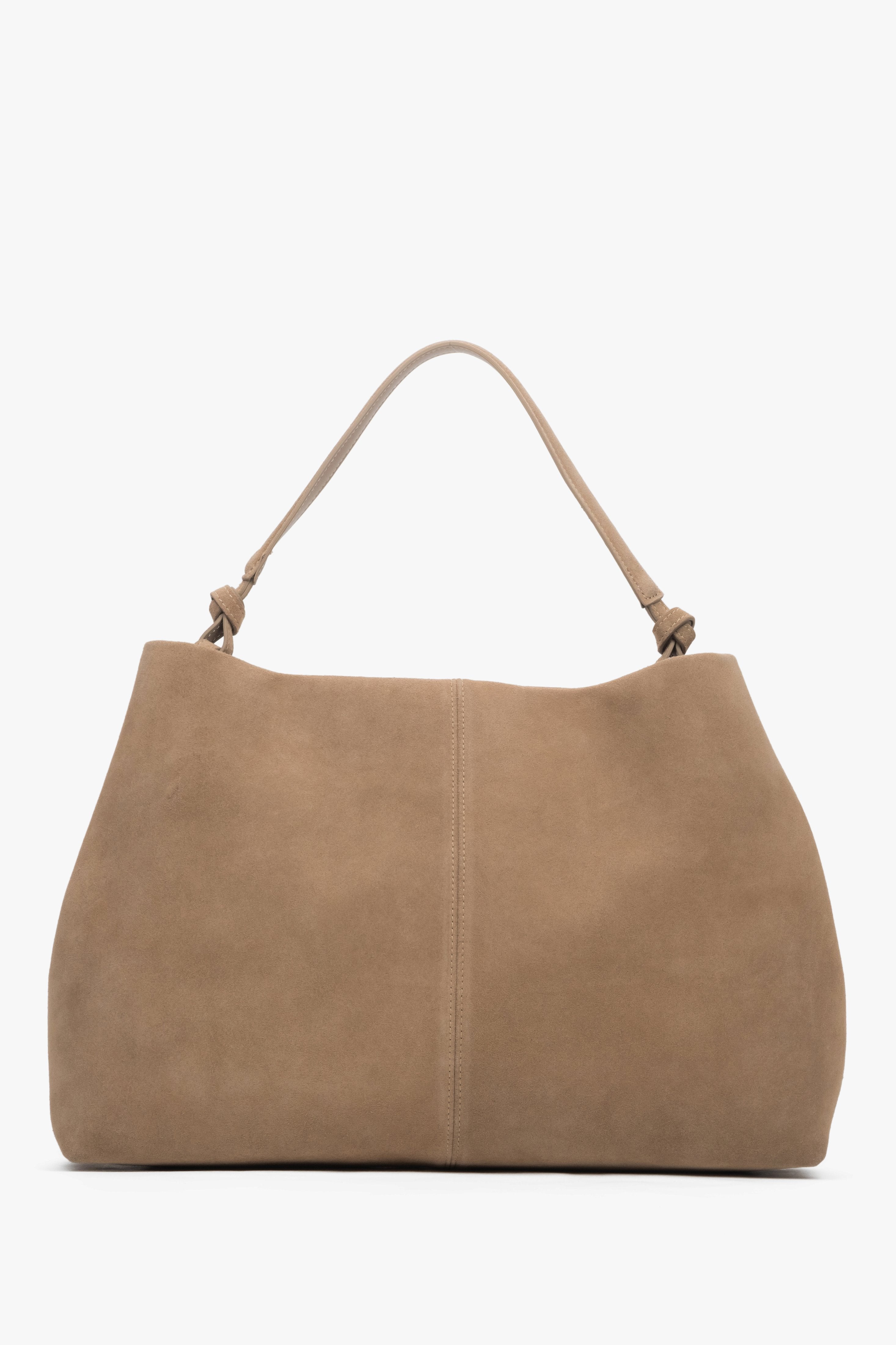 Spacious beige shopper bag with reinforced handles and one main compartment.