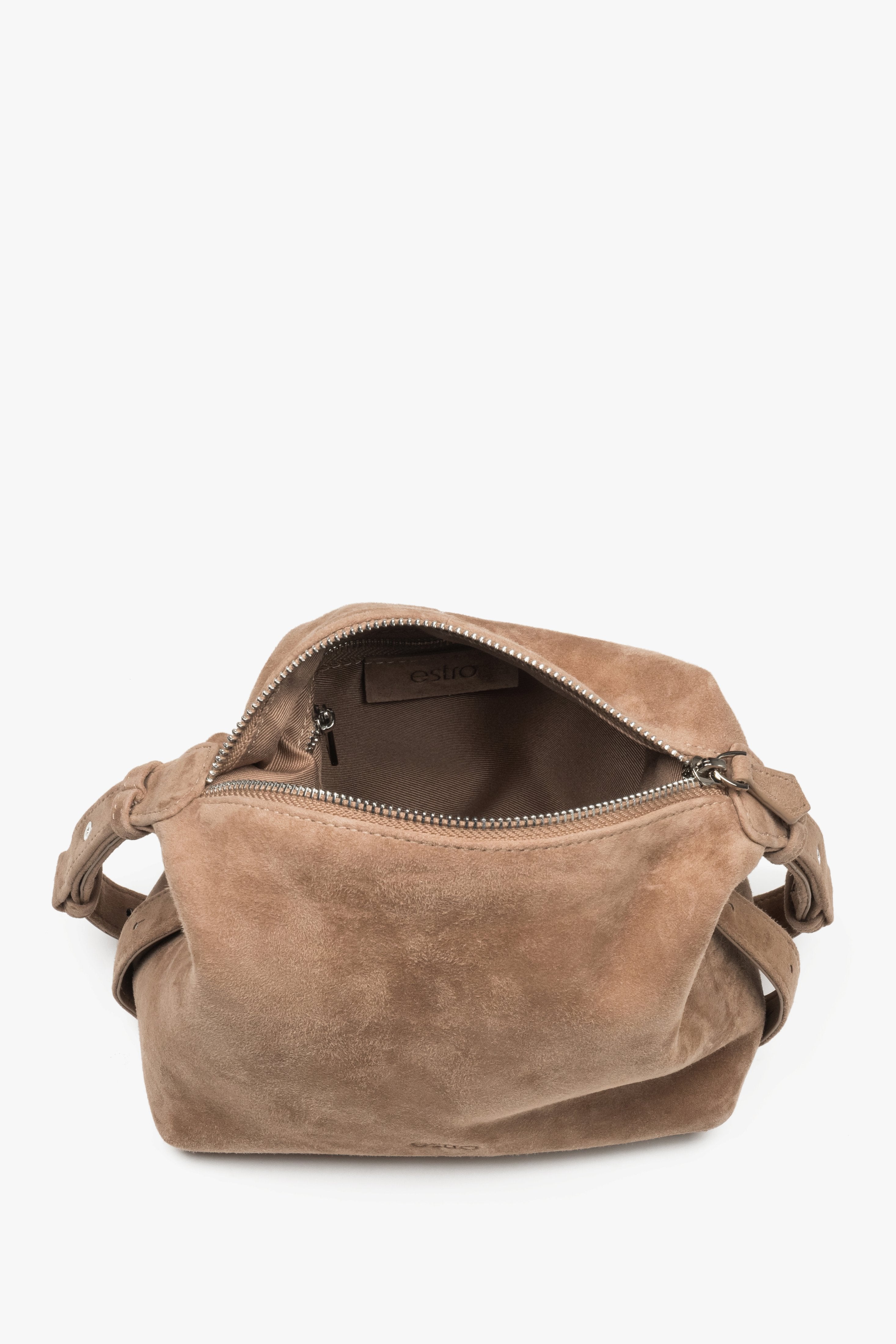 Wide-open zipper closure showcasing a spacious main compartment with a color-matched lining and functional internal pockets.