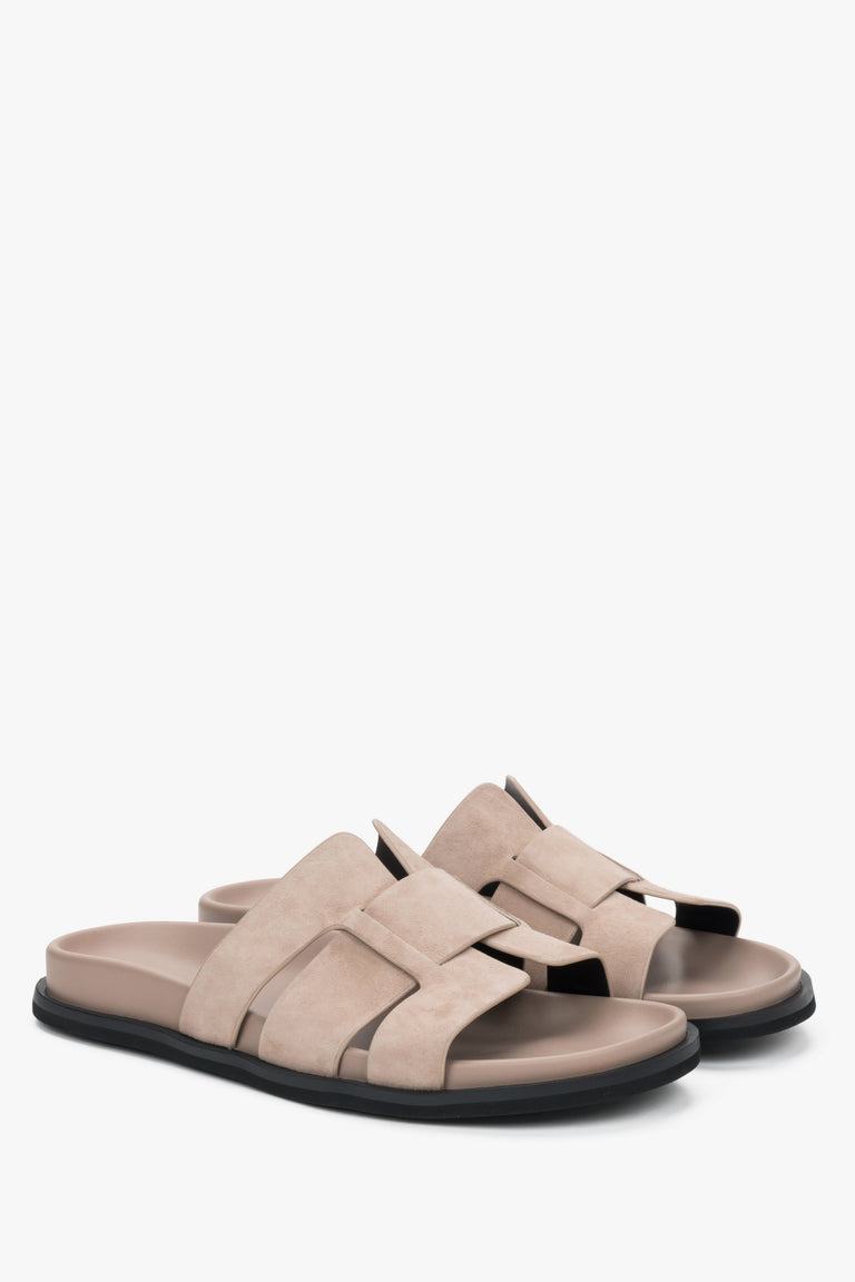Beige women’s velour slide sandals.