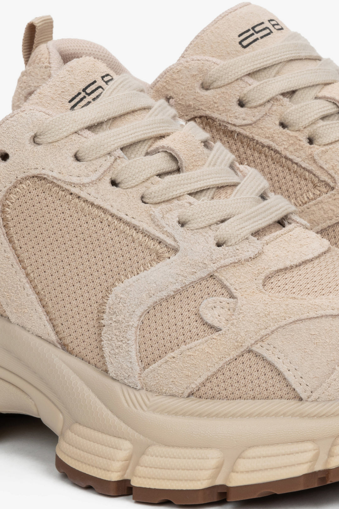 Women's premium beige velour and textile sneakers by Estro – an elegant angled presentation highlighting their modern, urban silhouette.