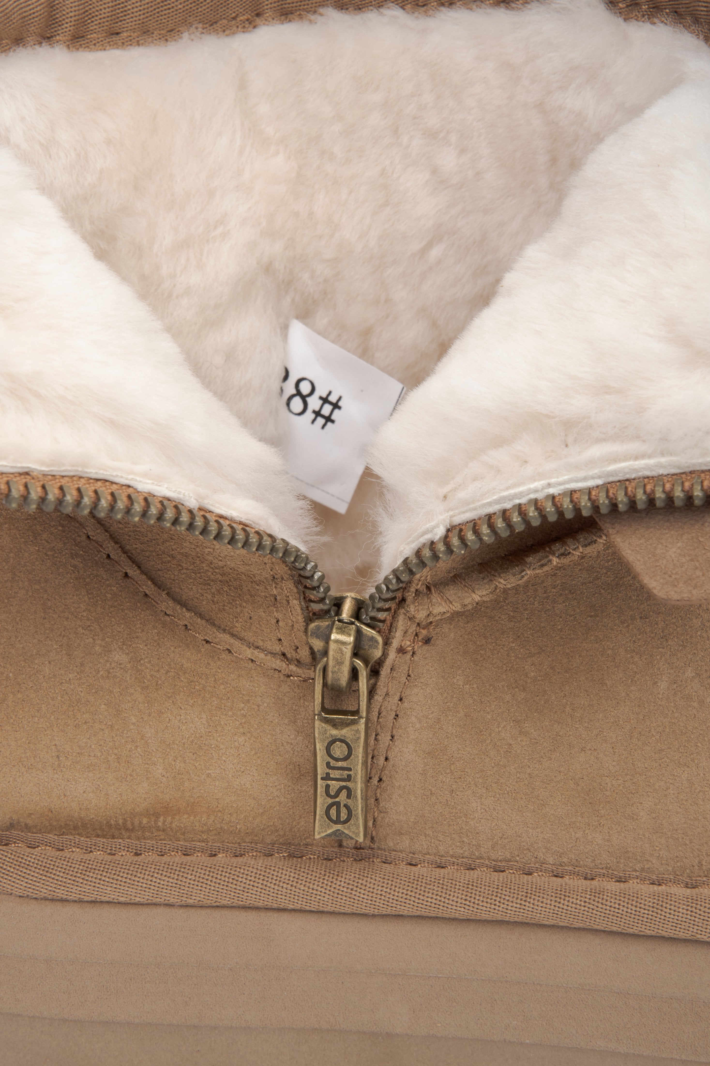 Elegant women's snow boots in beige, made of genuine velour with a fur-lined interior.