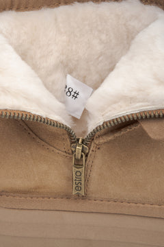 Elegant women's snow boots in beige, made of genuine velour with a fur-lined interior.