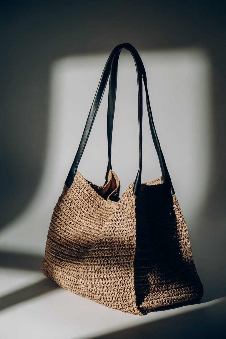 Women's beige straw shopper bag with dark reinforced handles