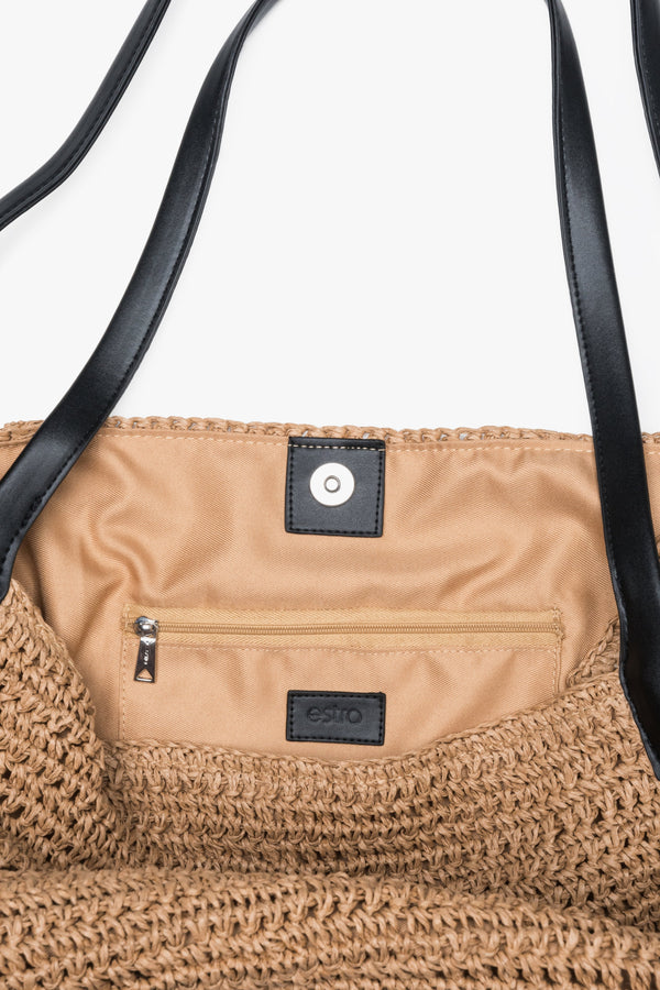 Interior detail of women's beige straw shopper bag by Estro