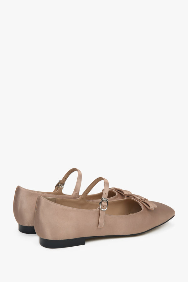 Buckled beige ballet flats for women.