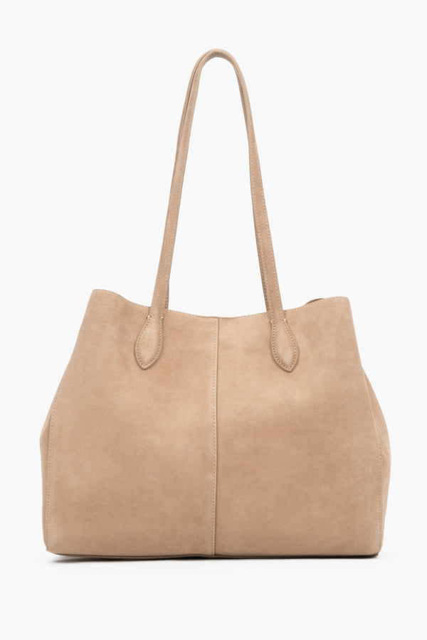 The back of the bag displaying perfect, vertical stitching down the center and the matte, noble texture of the light suede material.
