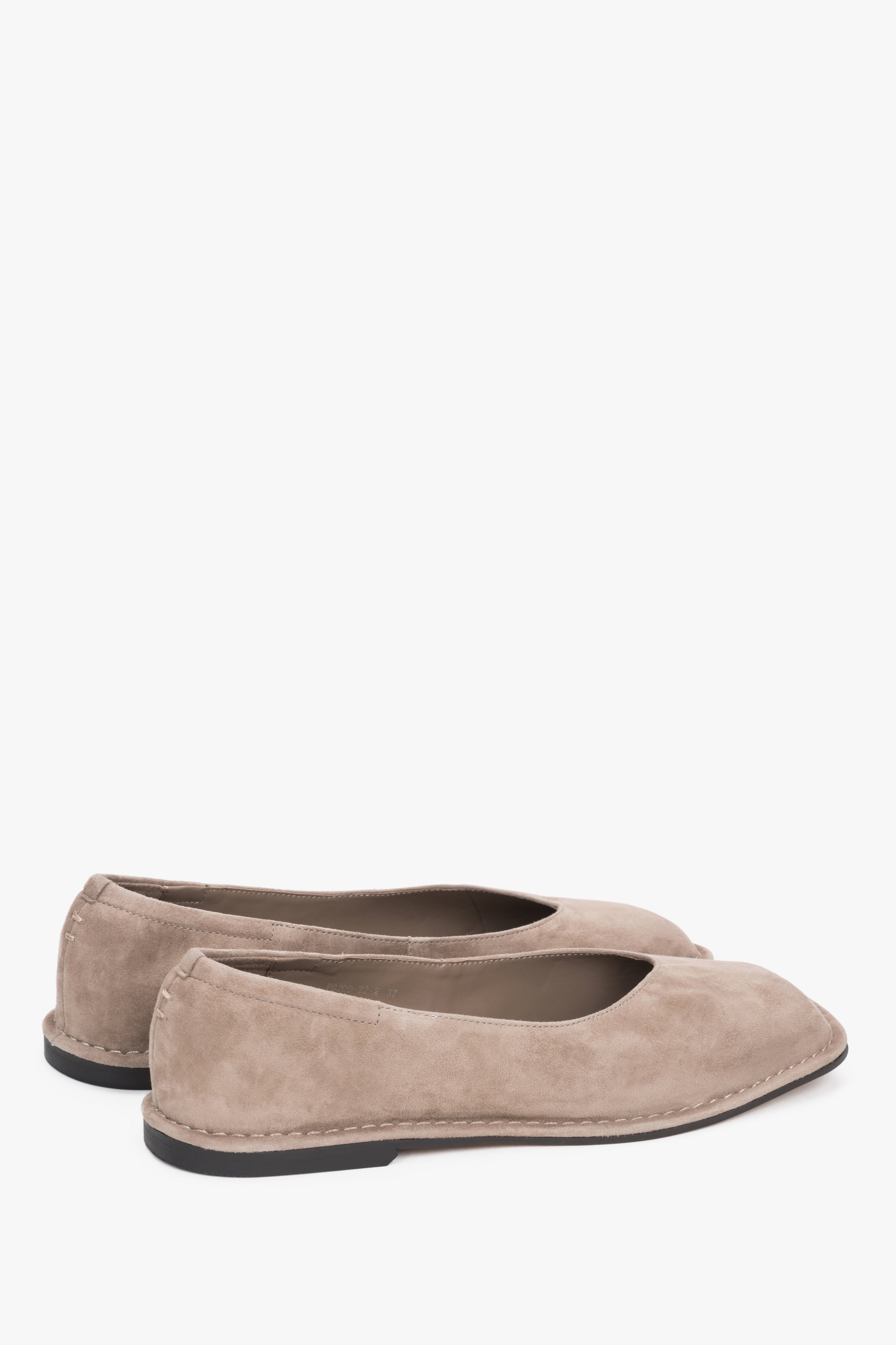 Angled view of women's beige velour barefoot ballet flats