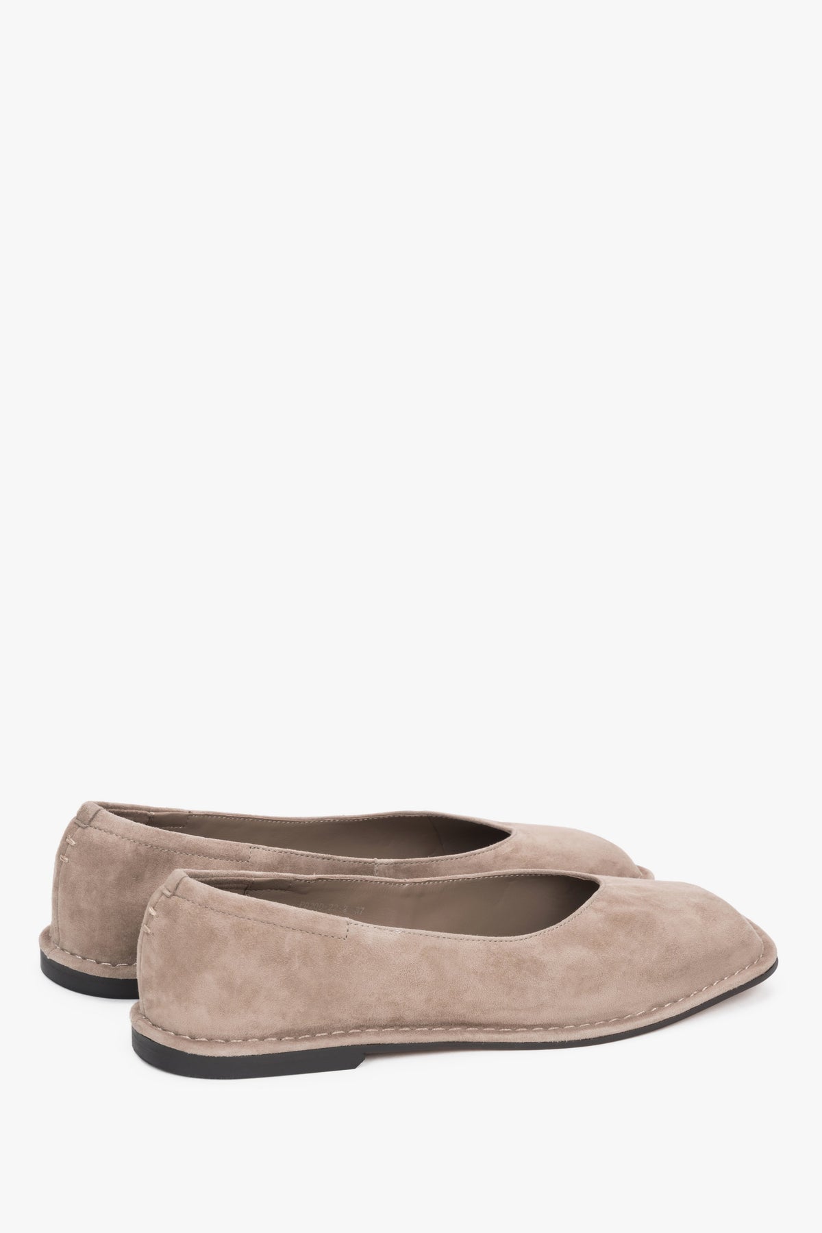 Angled view of women's beige velour barefoot ballet flats