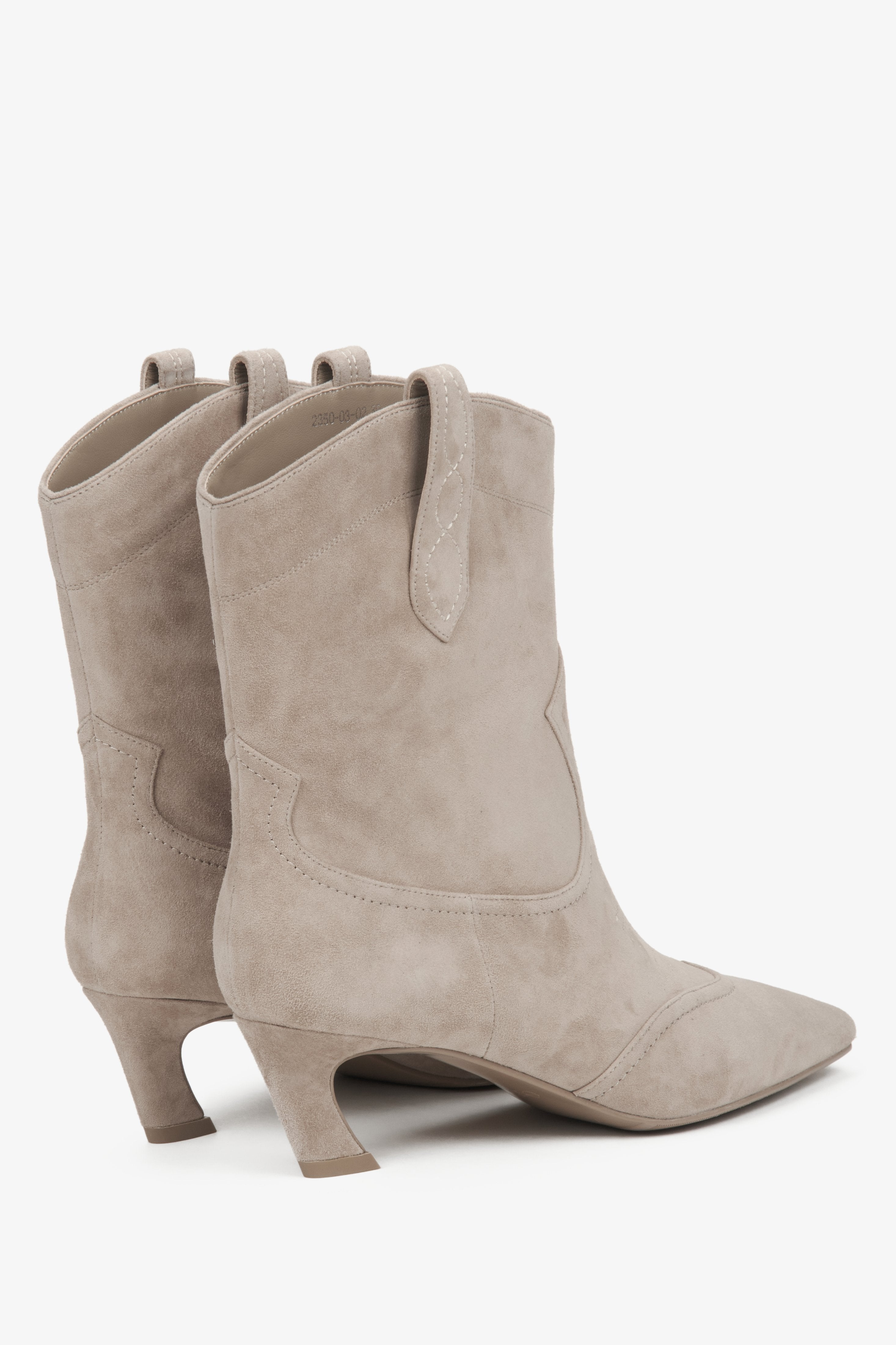 Women's beige cowboy boots made from soft velour, designed by Estro.