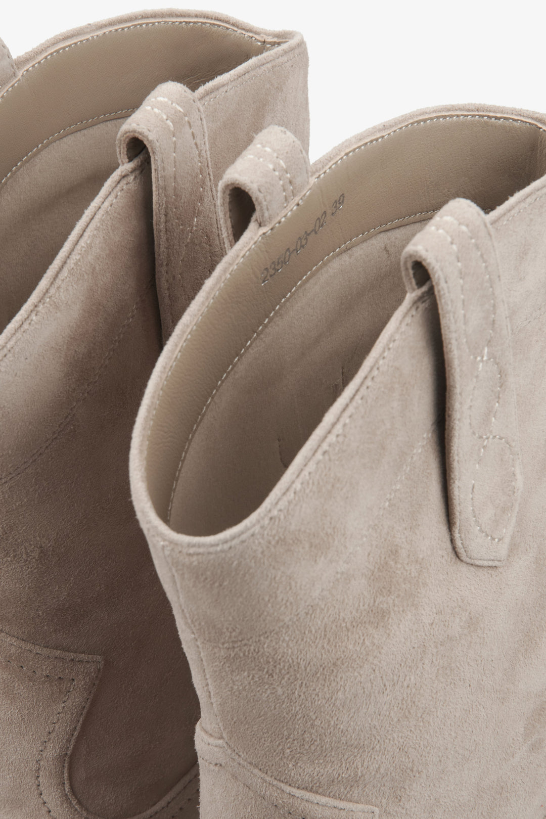 Elegant beige velour cowboy boots for women, created by Estro.