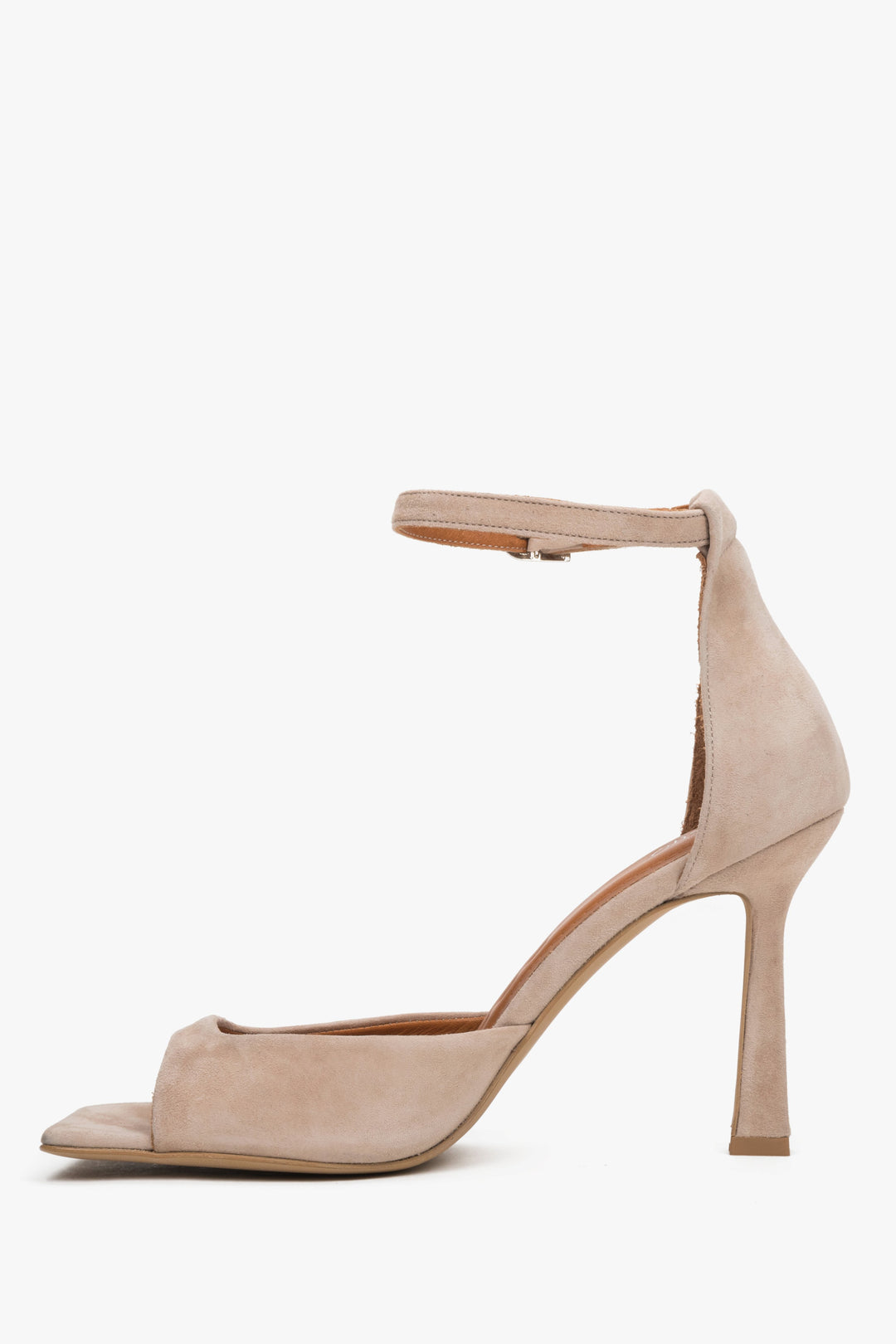 Beige women’s sandals made from natural velour, featuring a distinctive architectural silhouette and a stable 10 cm flared heel.