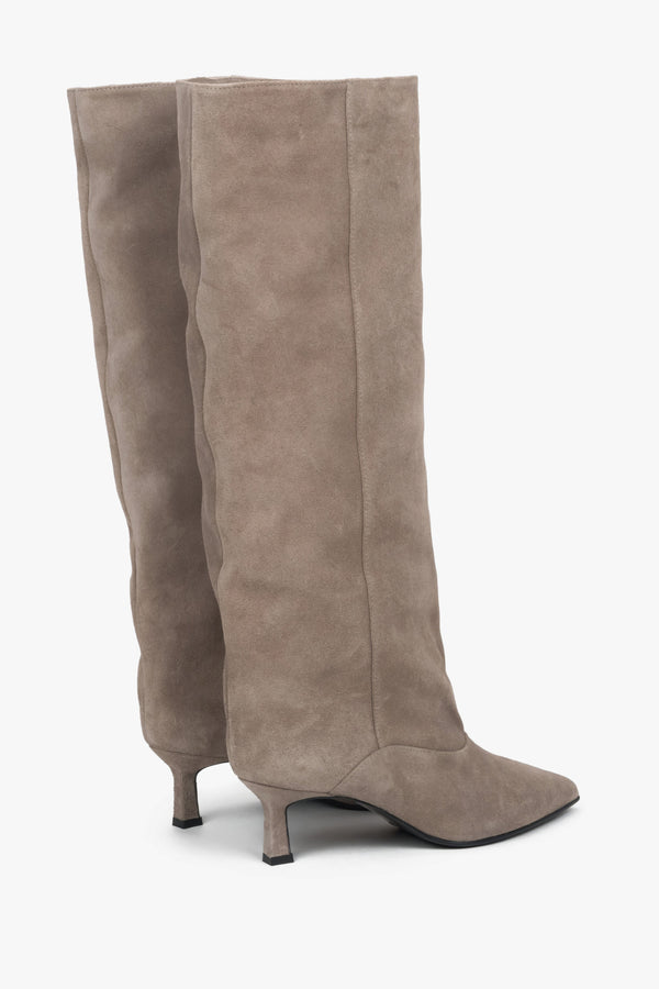 Made of genuine velour, women's beige knee-high boots with a low flared heel Estro.