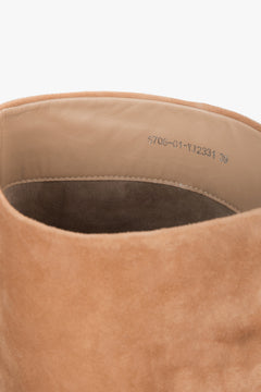 In natural velour, beige women’s knee-high boots with a stable funnel heel Estro.