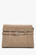 Women's beige velour shoulder bag with decorative buckle by Estro
