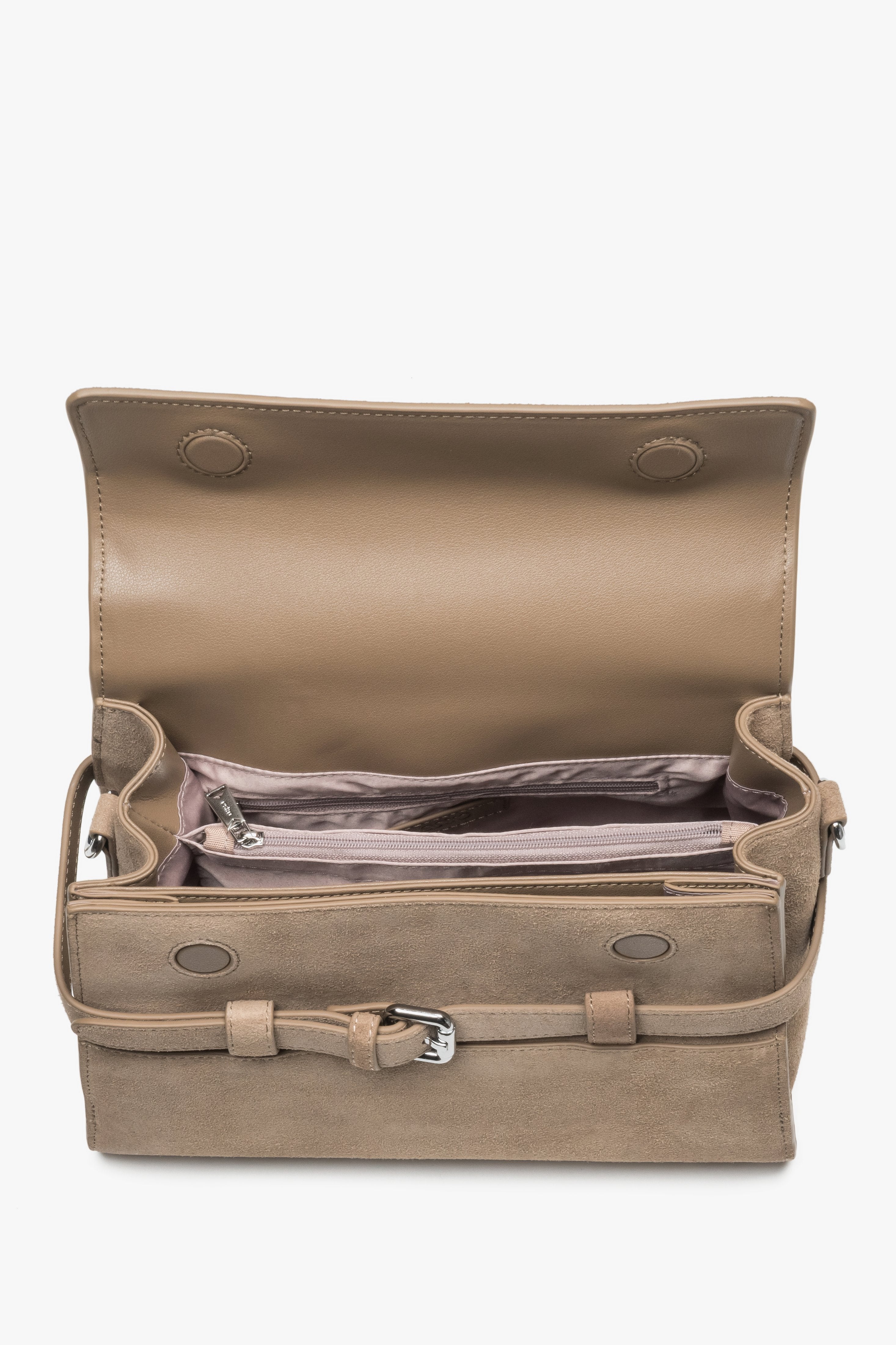 Interior view of women's beige velour shoulder bag with compartments