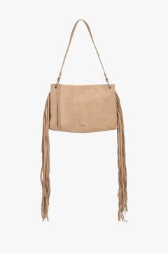 Women's beige Estro shoulder bag made of natural velour, featuring a smooth front design and long, dense fringes decorating the sides of the model.