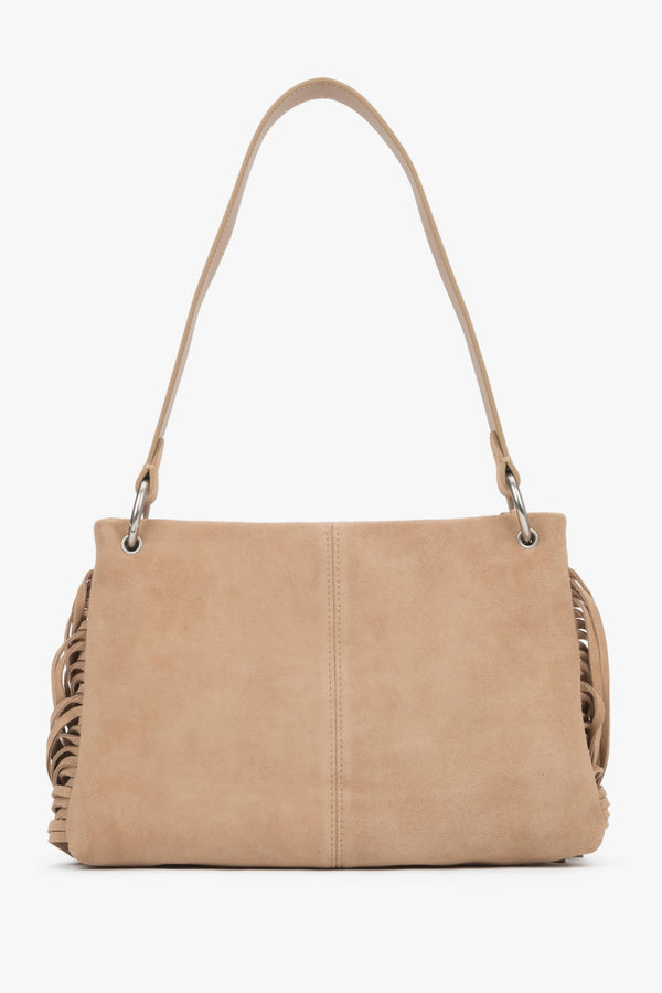 The back of the bag displaying precise, vertical stitching down the center and the light, luxurious texture of the suede material.
