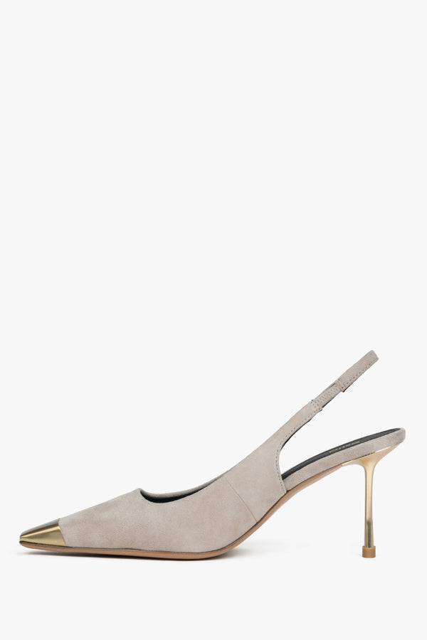 Low side view of women's beige velour slingback shoes with gold details