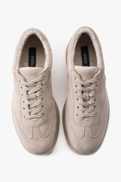 Beige women's velour sneakers with a soft faux fur lining for winter by Estro.