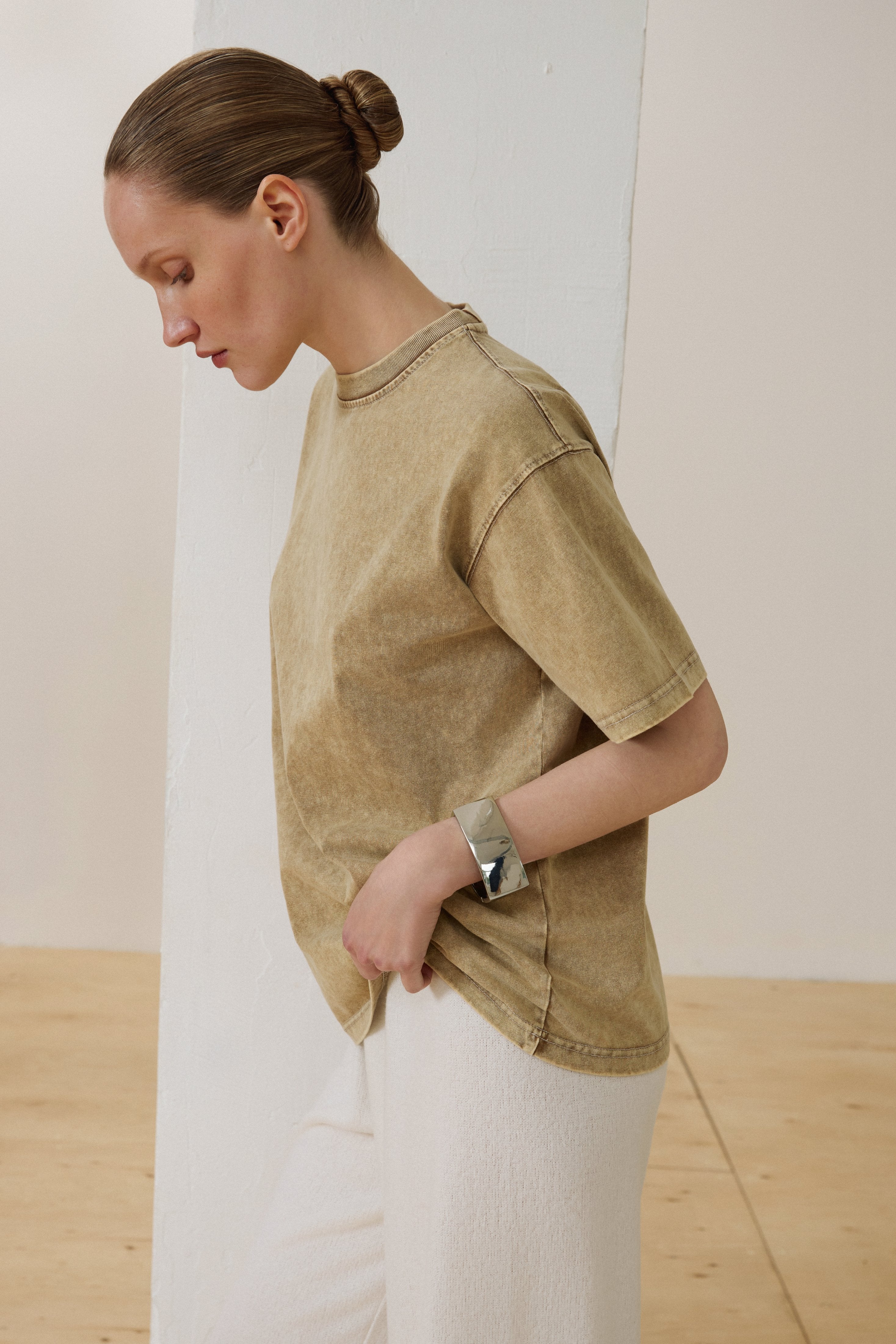 Women's beige T-shirt in a boxy-style silhouette.
