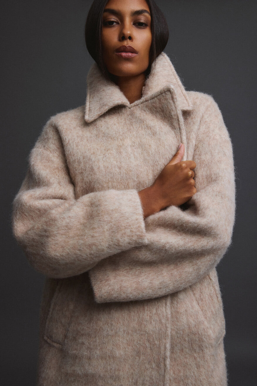 Women's beige trench coat with wool in beige.