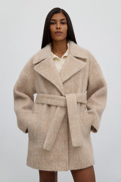 Women's beige wool trench coat.