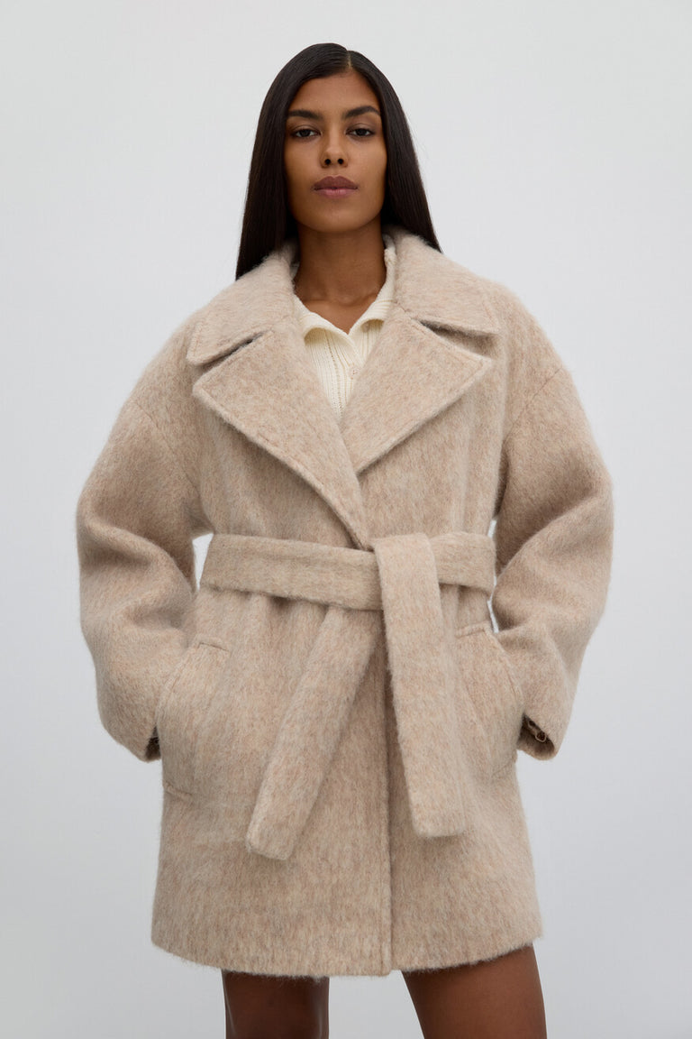 Women's beige wool trench coat.